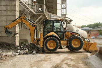 Погрузчик-экскаваторс гидромолотом Caterpillar 434E Погрузчик-экскаваторс гидромолотом Caterpillar 434E